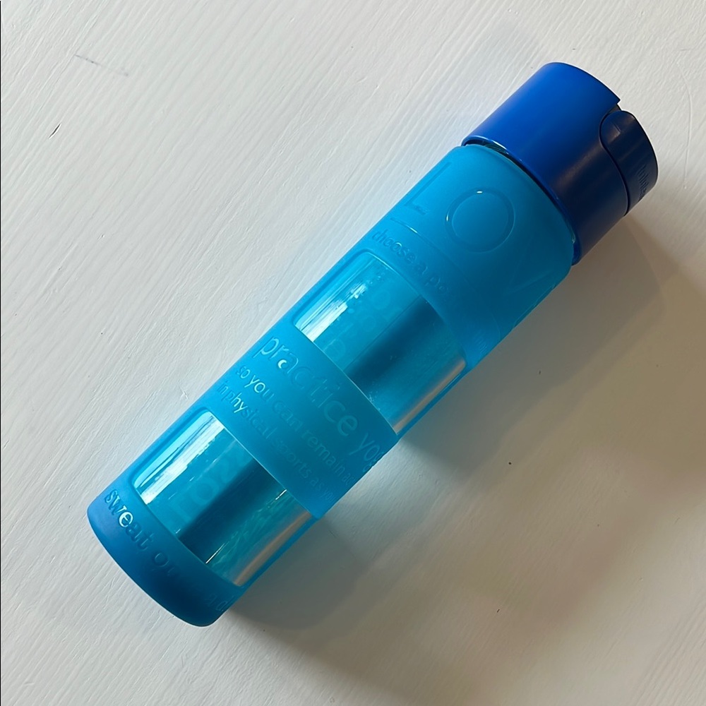 Lululemon Athletica glass water bottle with silicone sleeve